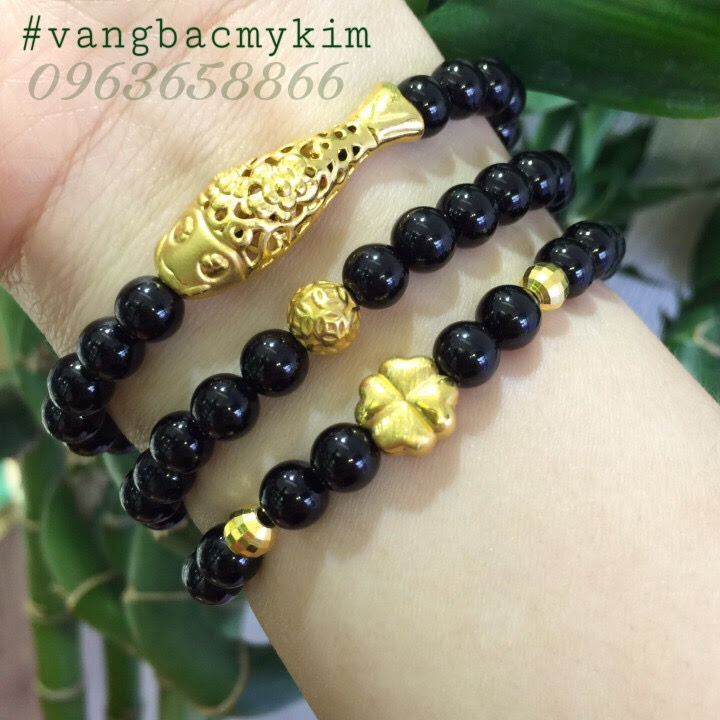Vòng đá tektit mix charm vàng 
