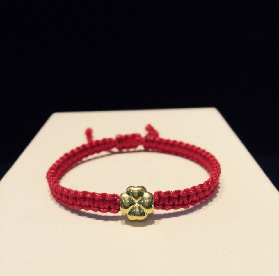 Vòng dây tết đỏ charm 4 lá vàng 24k