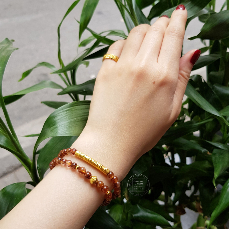 Vòng Thạch anh tóc nâu mix vàng Trú bình an Ummani