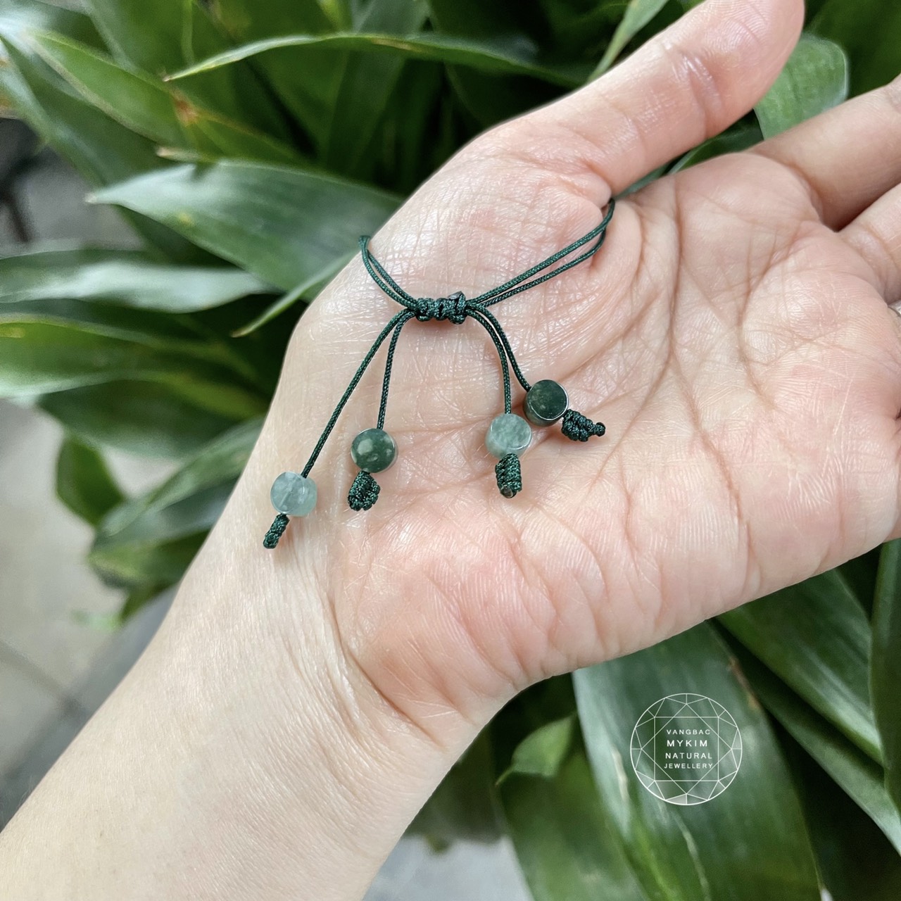 Dây tết Ngọc Phỉ Thúy băng dầu mix cánh hoa vàng 10k